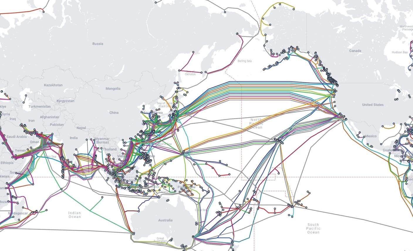 Global submarine cable map showing transpacific cable routes connecting the US, Hawaii, and Asia